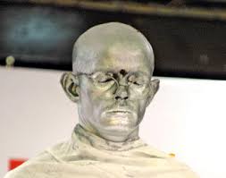 Akshinthala Seshu Babu stood motionless with no facial movements