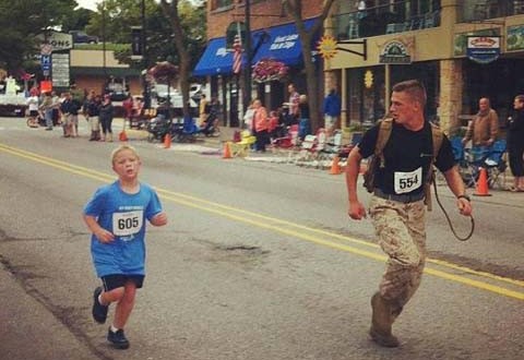 Photo of Marine running with boy posted on Facebook : Goes Viral