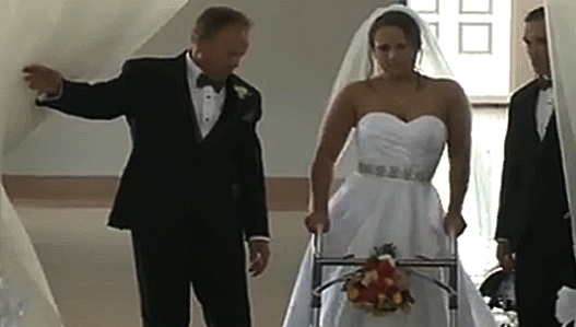 Stevie Beale: Paralyzed bride keeps vow to walk, carried down the aisle by husband