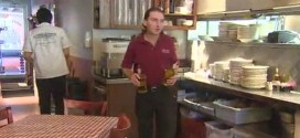 John boc gives struggling waitress $11,000 tips