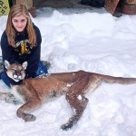 Girl, 11, shoots cougar to save brother
