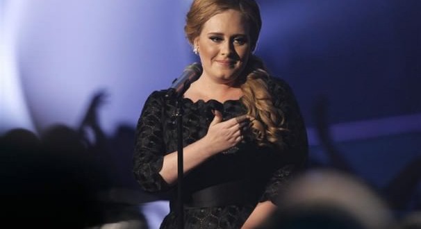 Adele demands all free tickets holders give money to charity