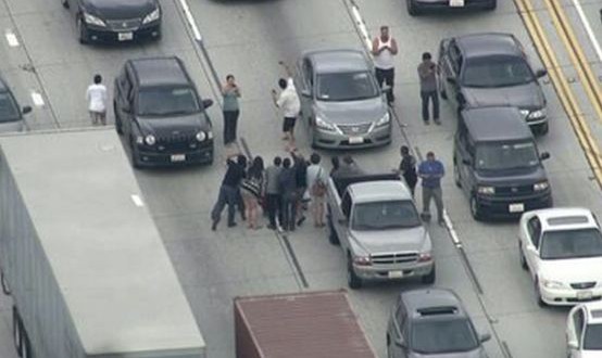 105 freeway closed : Drivers take selfies on roadway