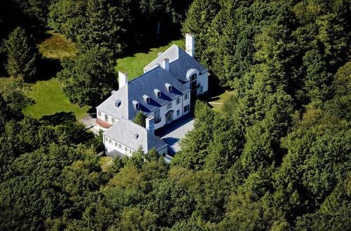 Heiress' French-style chateau sells for just $14M