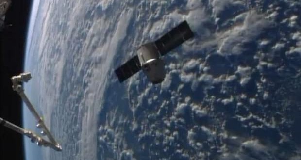 SpaceX Dragon capsule arrives at space station for Easter Sunday delivery