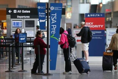 Five Boston airline employees charged in cash-smuggling sting