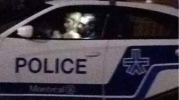 Montreal cop caught in compromising position (Photo)