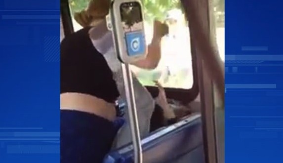 Surrey woman arrested after bizarre bus assault (Video)