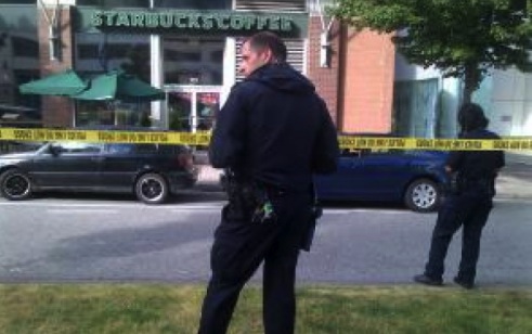 Three shot outside Vancouver coffee shop