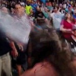 Wrestler spits beer in face of Cowboys DE George Selvie