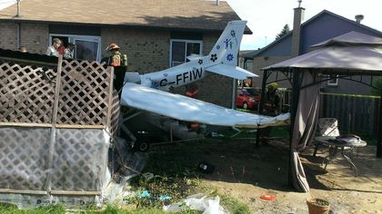 Pilot crash-lands plane into Quebec yard (Video)