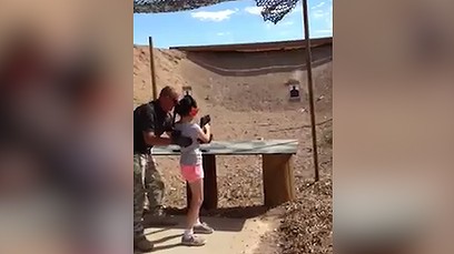 Girl firing Uzi at shooting range accidentally kills instructor
