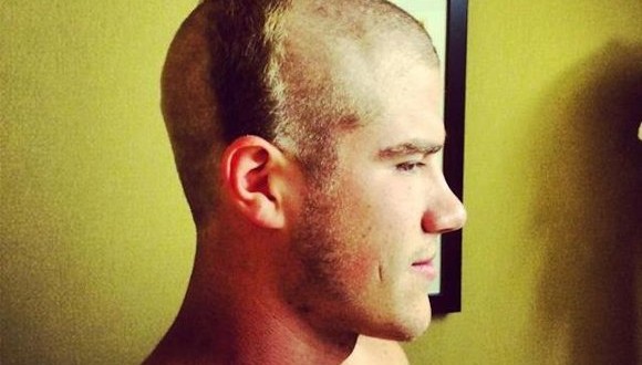 Zach Hocker receives hideous hazing haircut