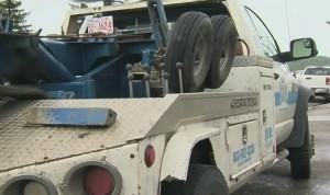 Alberta Tow-truck driver climbs onto moving vehicle to stop thief