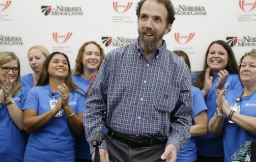 Massachusetts Doctor Cured Of Ebola Returns Home