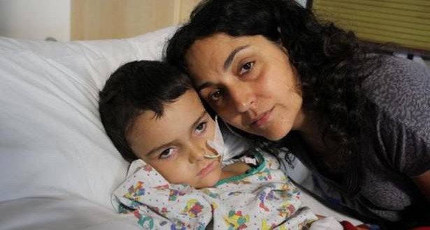 Spain orders detention for parents of boy with brain tumor, Report