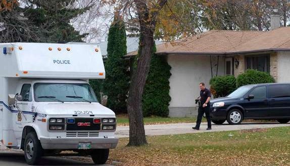 Winnipeg Police search accused woman’s home as legal battle continues over autopsies