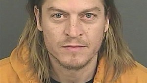 Puddle of Mudd singer arrested at Denver airport after riding luggage carousel