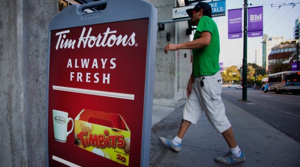 Vancouver Tim Hortons apologizes after water dumped on homeless man (Video)