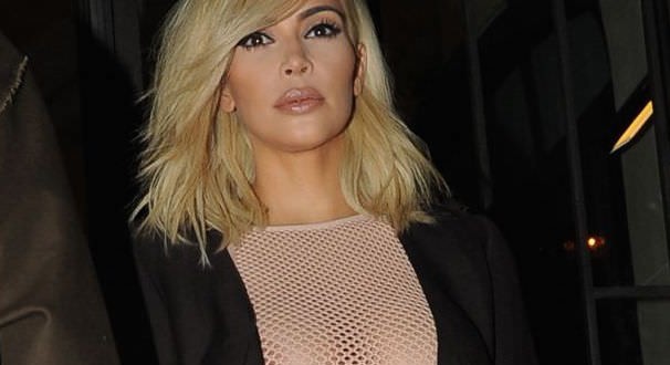 Kim Kardashian steals attention with mesh dress (Photo)