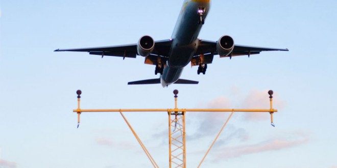 Passenger opens emergency exit and leaps 15ft down to the tarmac, then walks out of airport without being stopped