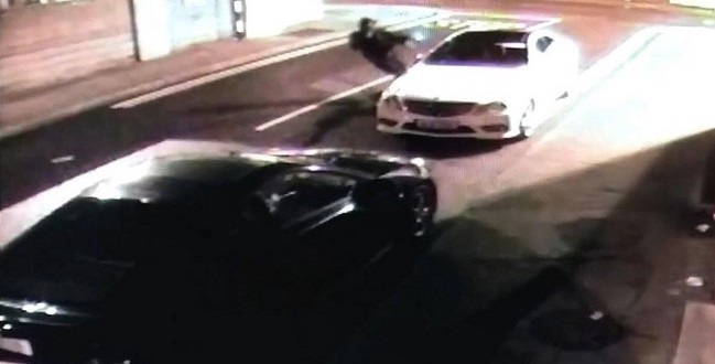 Thief knocked out when brick bounces off a car (Video)