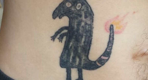Charmander Tattoo : Man does worst ever Pokemon tattoo – on himself