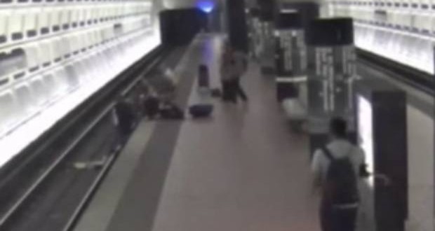 Man in wheelchair rescued from Metro tracks (Video)