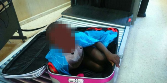 Boy Smuggled In Suitcase : Border police scanner reveals boy, 8, curled up in suitcase