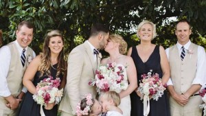 Flower Girl Steals Kiss From Ring Bearer (Photo)