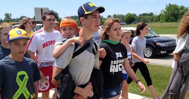 Hunter Gandee : Teen walking 57-miles with brother on back (Video)