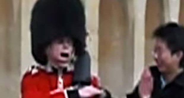 Queen's Guard Points Gun And Bayonet At Tourist Who Touches Hin (Video)