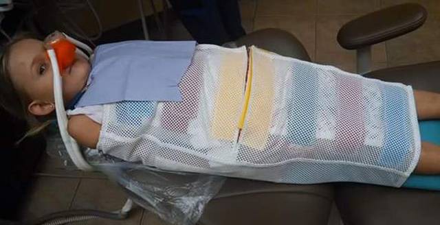 Dentist used 'body bag'? Georgia family outraged by the way child was treated at dentist