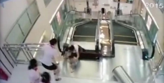 China Escalator Accident : Mom Saves 2-Year-Old Before Tragic Fall ‘Video’