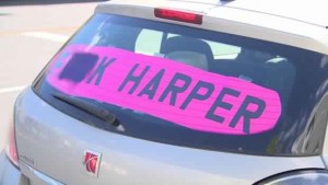 Edmonton man to fight $543 fine over profane Harper sign