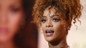 Rihanna slammed by anti-fur protesters at perfume launch in New York (Video)