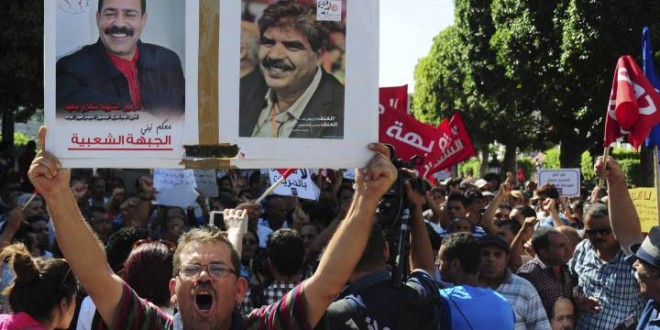 Tunisians March At Capital : Hundreds protest new amnesty offer