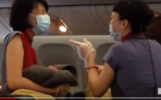Baby born on plane over the Pacific (Video)