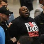 Donald Trump protester removed from Birmingham rally