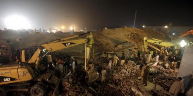 Pakistan factory collapse kills 20, over 100 rescued