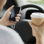 Demerits coming for distracted drivers in Alberta, Report