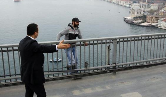 Erdogan talks man on bridge out of suicide (Video)