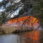 CN trestle bridge in flames at Mayerthorpe, Alta. (Video)