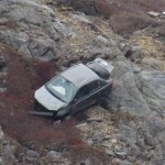 Young Woman Ejected from Tumbling Vehicle on Signal Hill (Video)