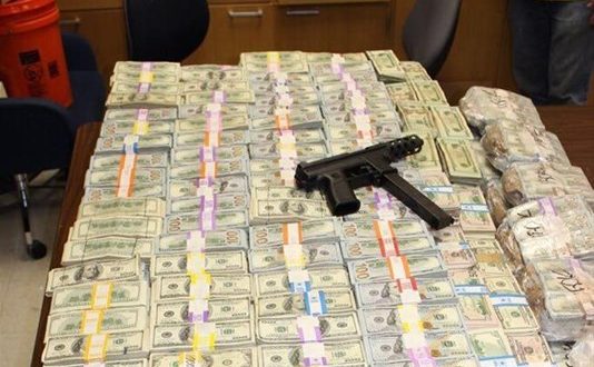 Cops find $24 million in cash within walls of home (Video)