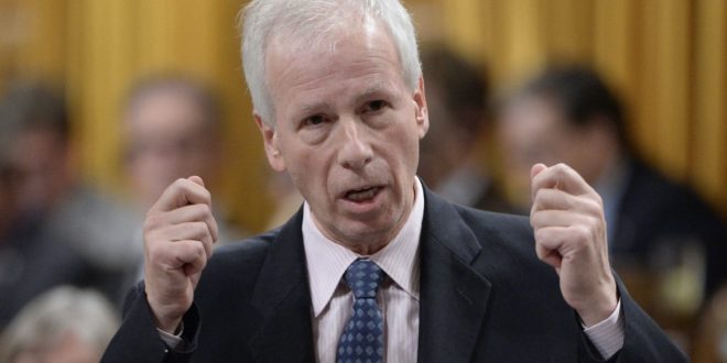 Foreign affairs minister Stéphane Dion apologizes to Alison Azer