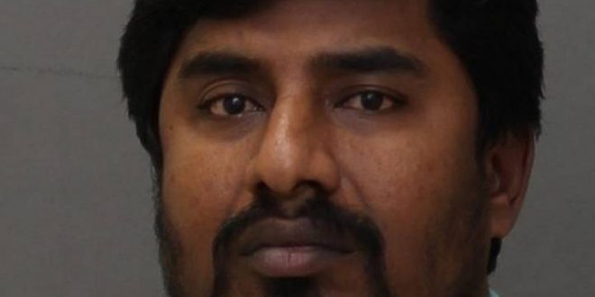 Indian man charged after defrauding victim of $100000