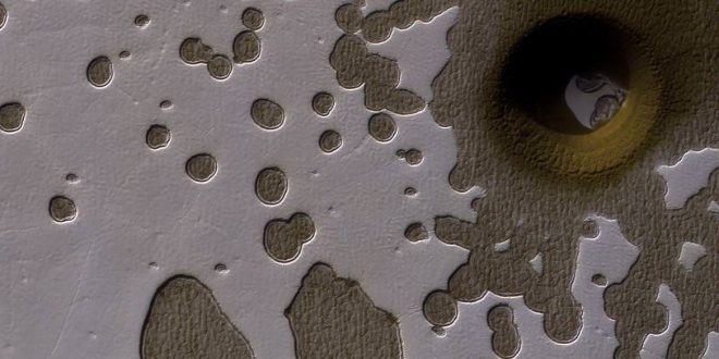 Researchers have no idea what made this huge hole on Mars