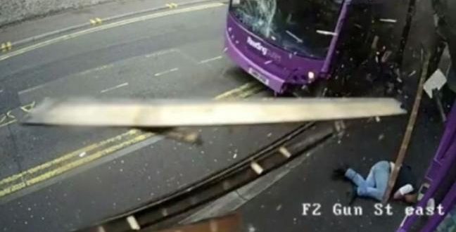 UK man gets hit by bus, gets up and walks into bar (Video)