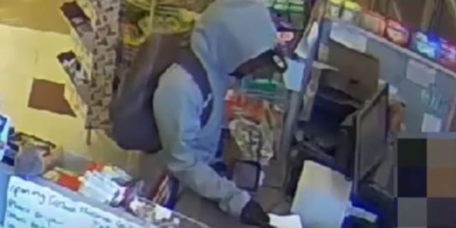 Pharmacy robber sick child, 'Give me all the money'